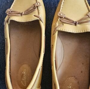 Clarks Tan Flats with Signature Comfort and Style